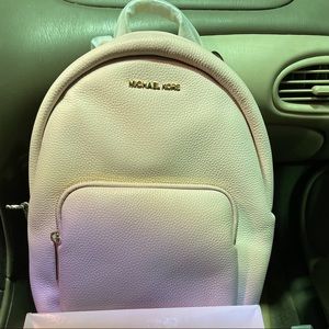 Michael Kors slim pastel pink backpack